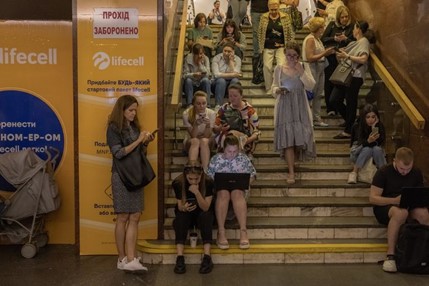 People take shelter from Russian missile attack in a subway station in Kyiv